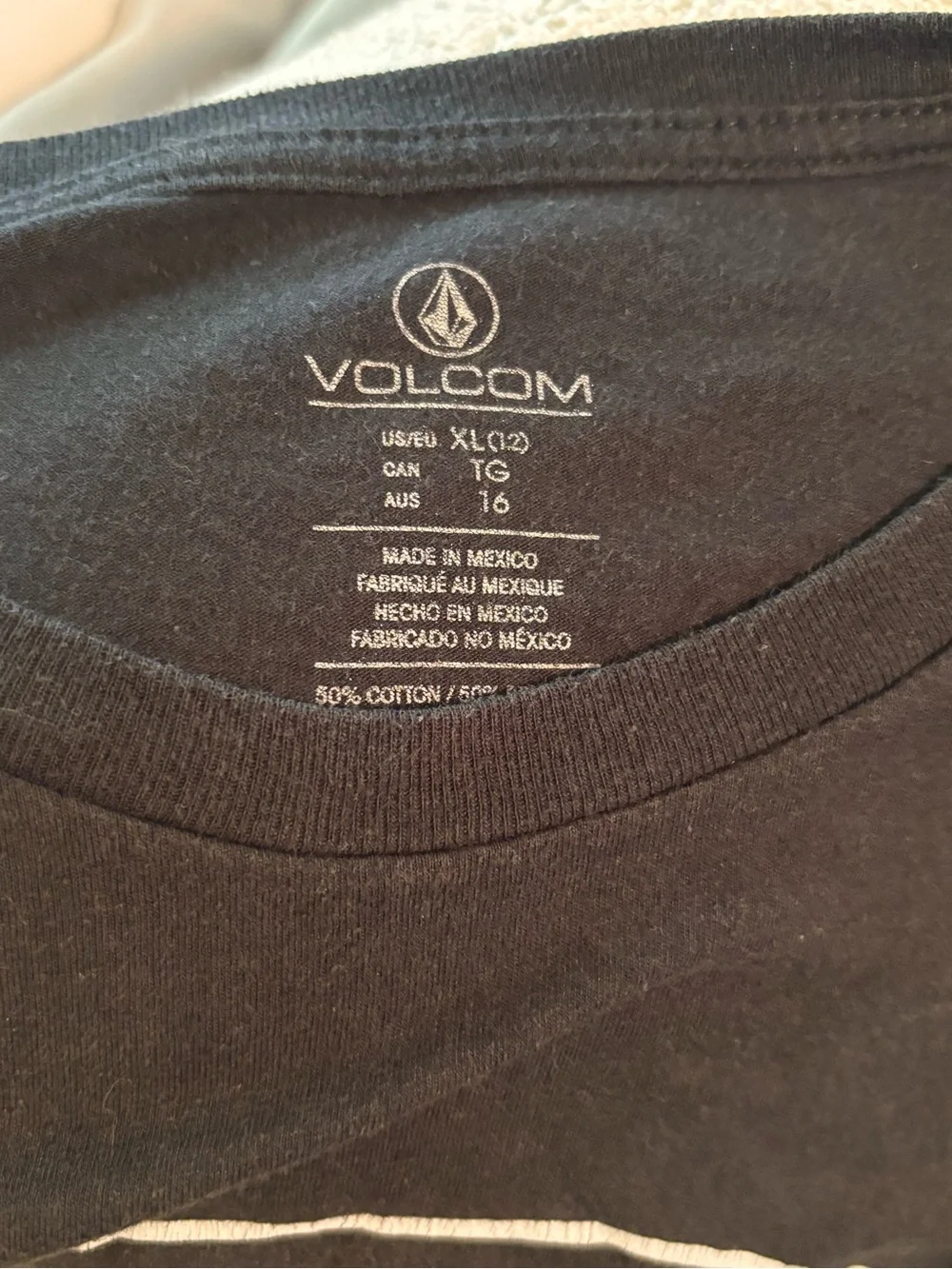 Volcom Black Tee with Pink & White Floral Logo